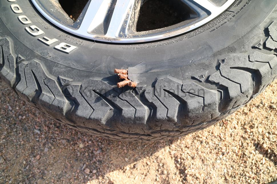 Tyre destroyed by granite spike Tyre destroyed by granite spike